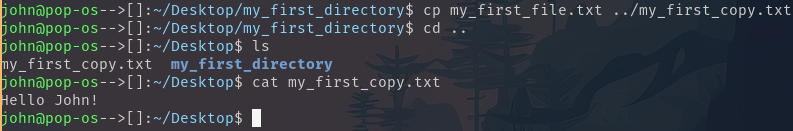 Image of terminal after copying a file to the Desktop directory, changing into the parent directory, listing directory contents, and concatenating the contents of the copied file