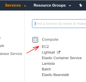 Screen shot of AWS console with a red arrow pointing to the EC2 link in the Services dropdown