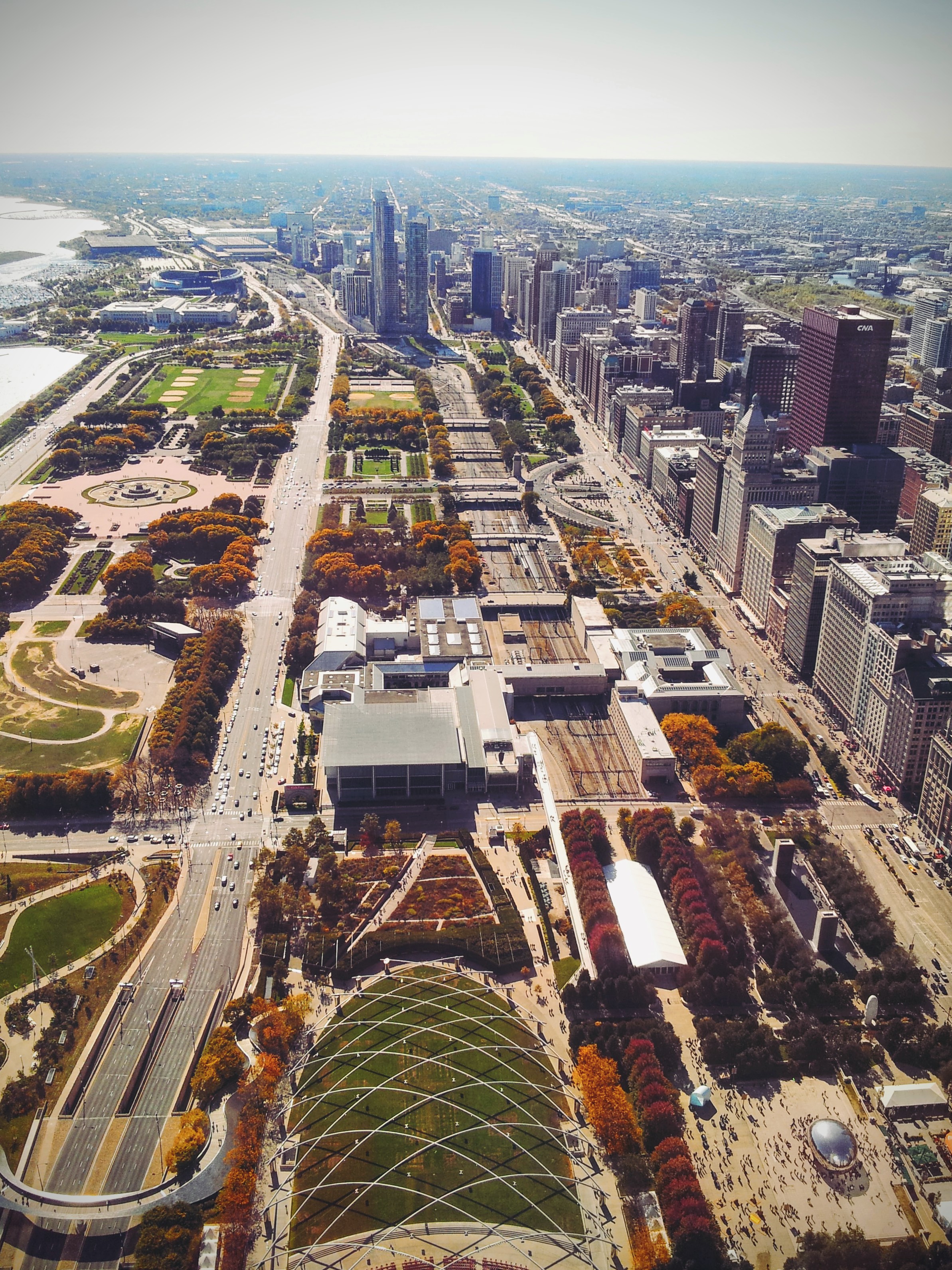 Facing the South Loop, overlooking Millennium Park, Grant Park, Cloud Gate (aka The Bean), the Art Institute, and Museum Campus